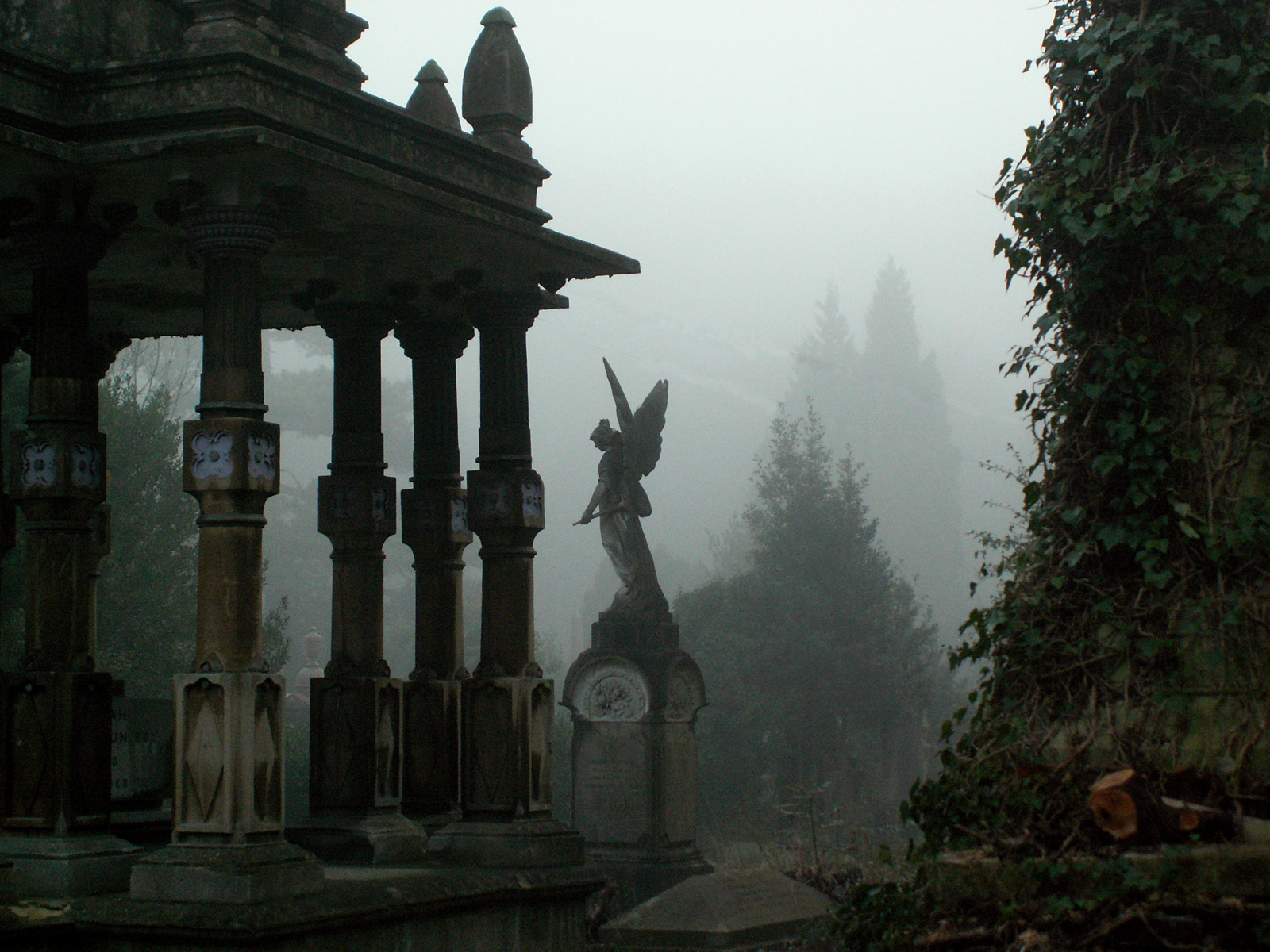 statues-in-the-mist-within-cemetery.jpg